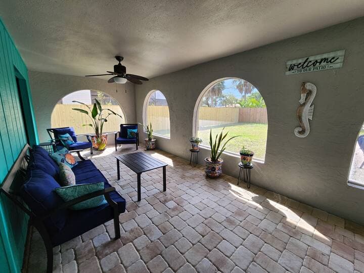 Screened patio with comfortable seating